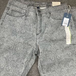 Grey animal print skinny jeans.